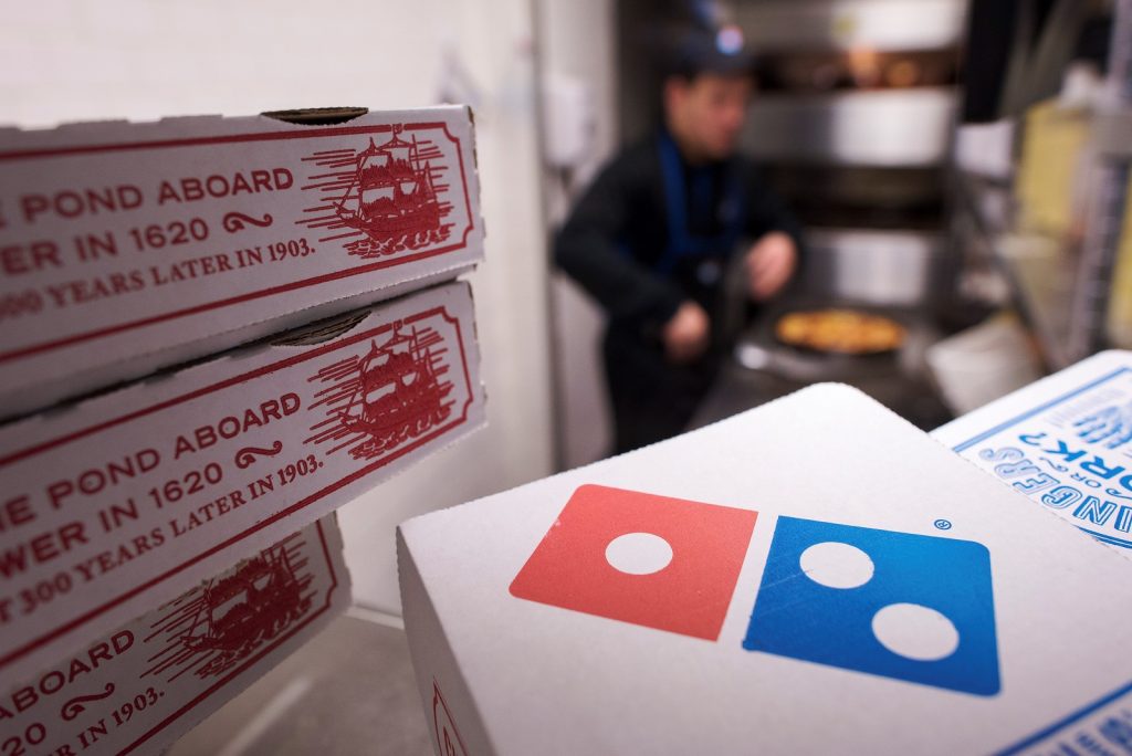 Domino's has mastered using new technology to make ordering pizza more convenient than ever and it's showing in sales. (Craig Warga/Bloomberg)