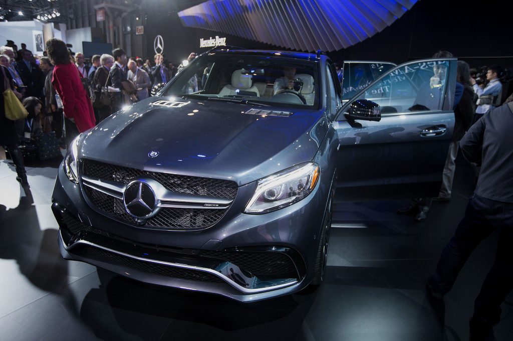 Members of the media view the Daimler AG Mercedes-Benz GLE 63 AMG sports utility vehicle (SUV). The model is one of several Mercedes produces at its Alabama plant. (Michael Nagle/Bloomberg)