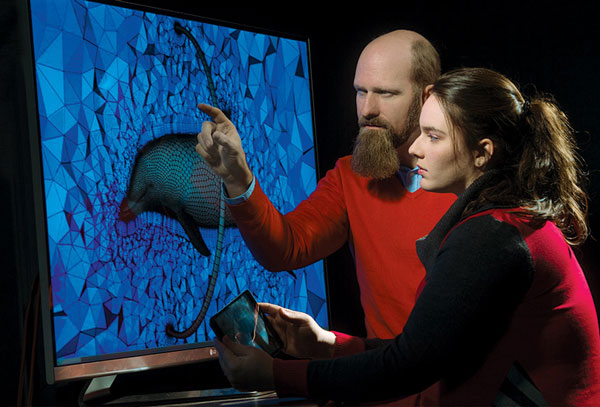 No interest in reinventing the wheel: "We want to do really neat things that haven’t been done before – and make a difference," said ETLab Director Corey Shum (above, with UAB student Hannah Hellwig).