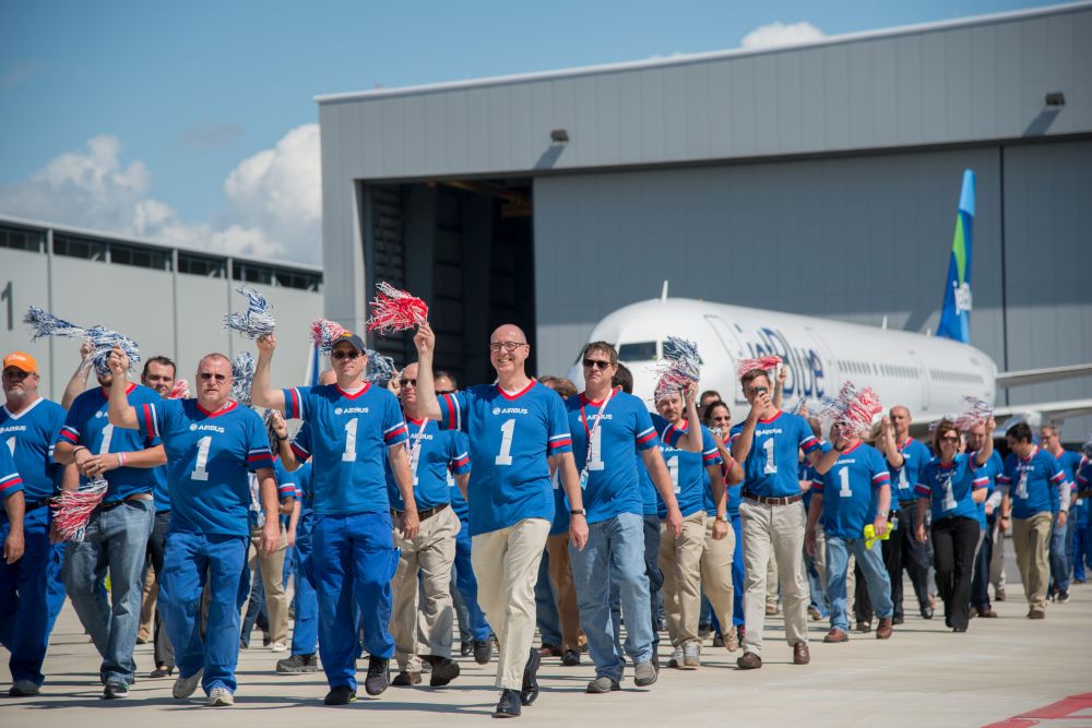 Workers celebrate the delivery today. (Made in Alabama)