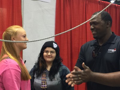 Safety and Training Specialist Delron Garrett (right) was among employees who shared information about Alabama Power with students such as Jarvis (left) and Hope. (Contributed)