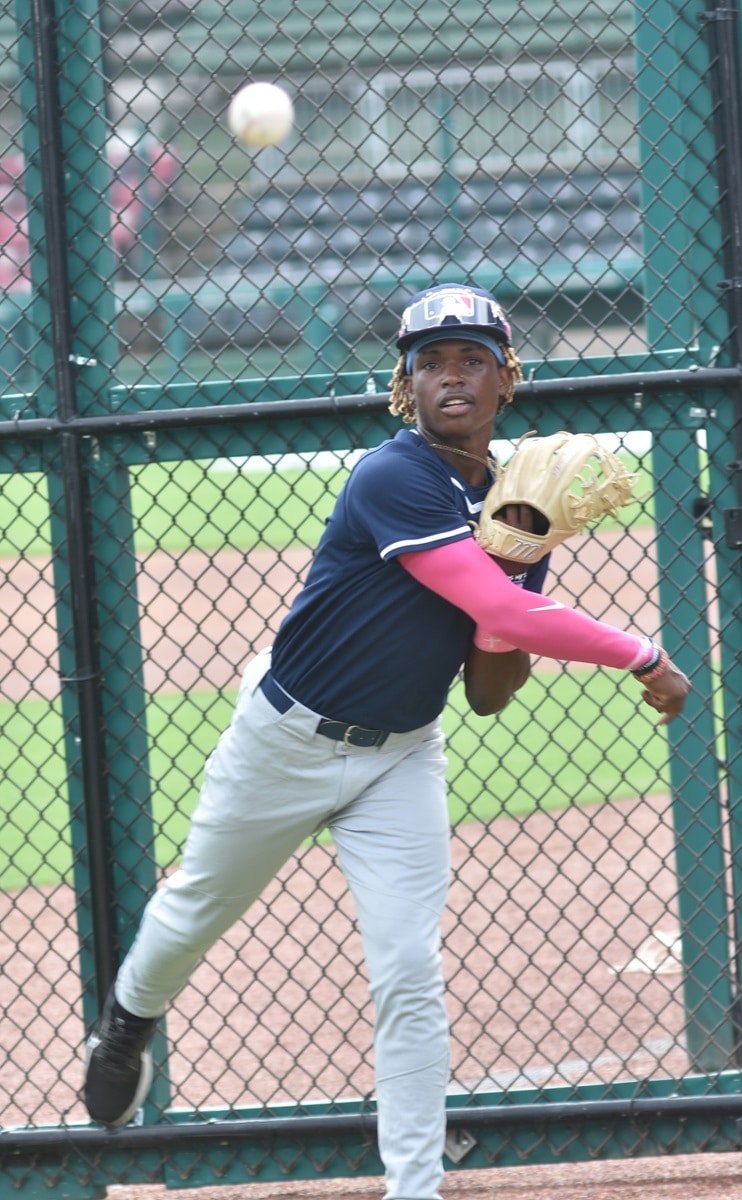 A Breakthrough Series player practices some pitches at Rickwood Field. (Solomon Crenshaw Jr. / Alabama News Center)