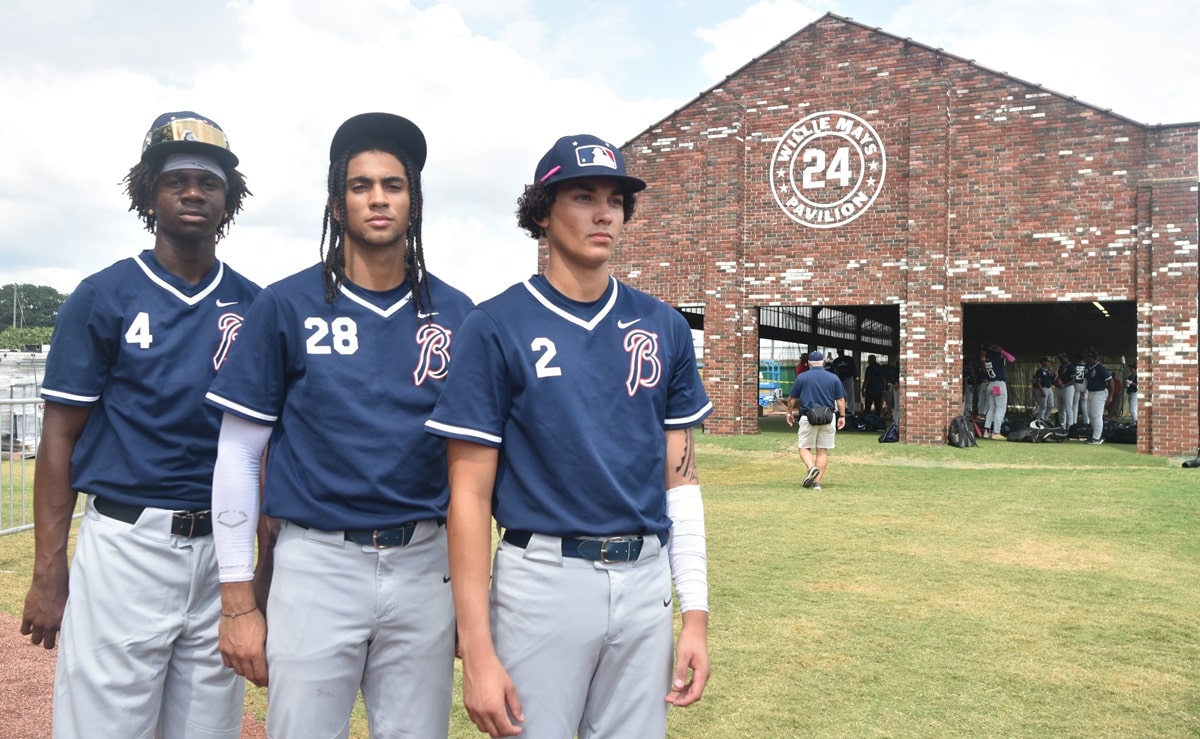 Three Breakthrough Series players pause outside Willie Mays Pavilion at Rickwood Field. (Solomon Crenshaw Jr. / Alabama News Center)