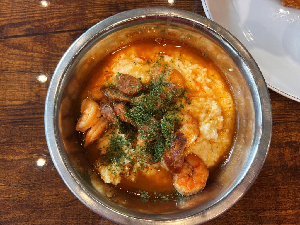The shrimp and grits at Yo' Mama's is a popular menu item. (Michael Tomberlin / Alabama News Center)