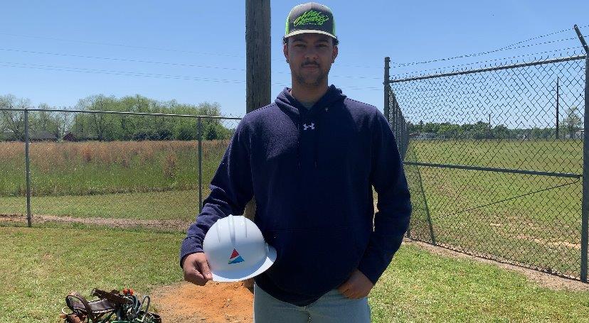 Gavin Cox participates in Headland Lineworker Career Day. (Teisha Wallace / Alabama News Center)